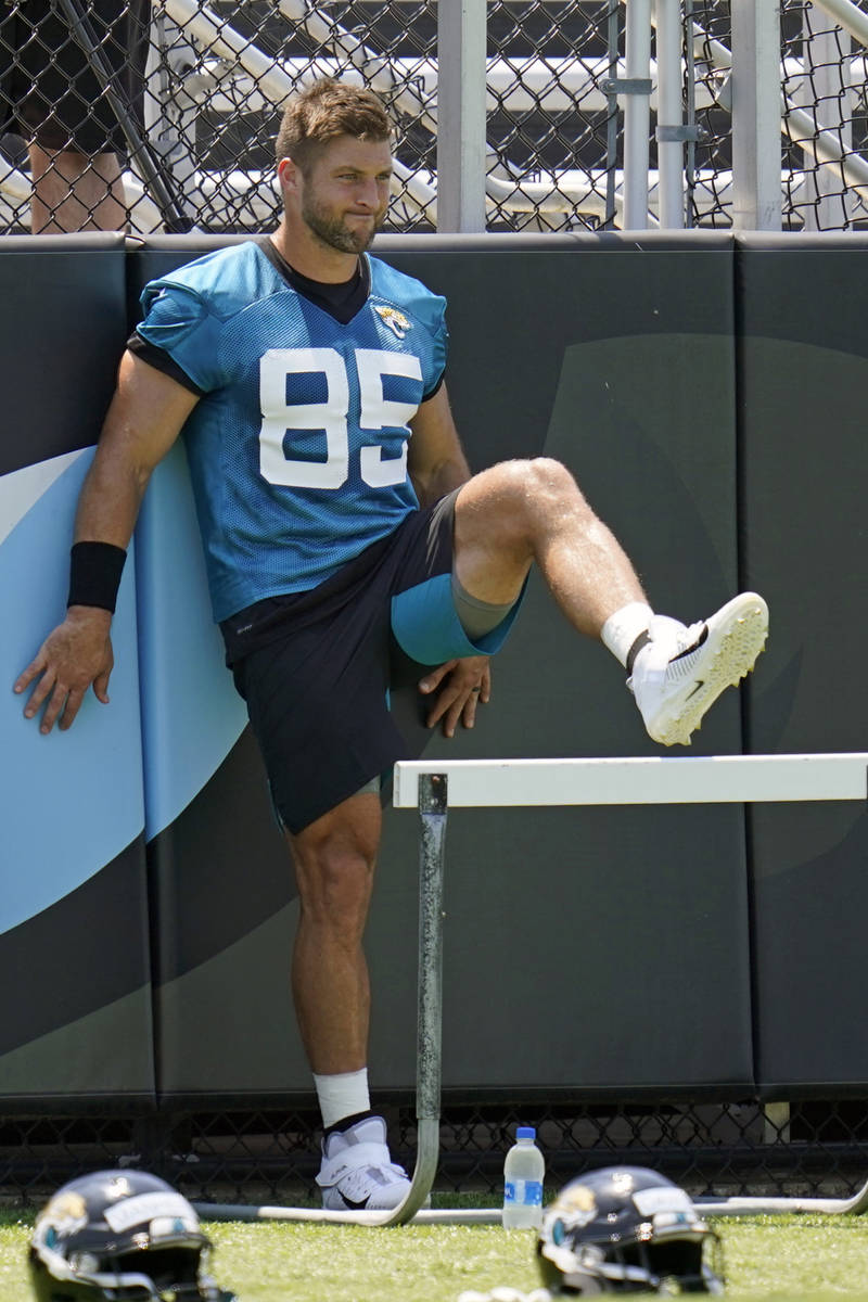 Jacksonville Jaguars tight end Tim Tebow (85) warms up during an NFL football team practice, Th ...