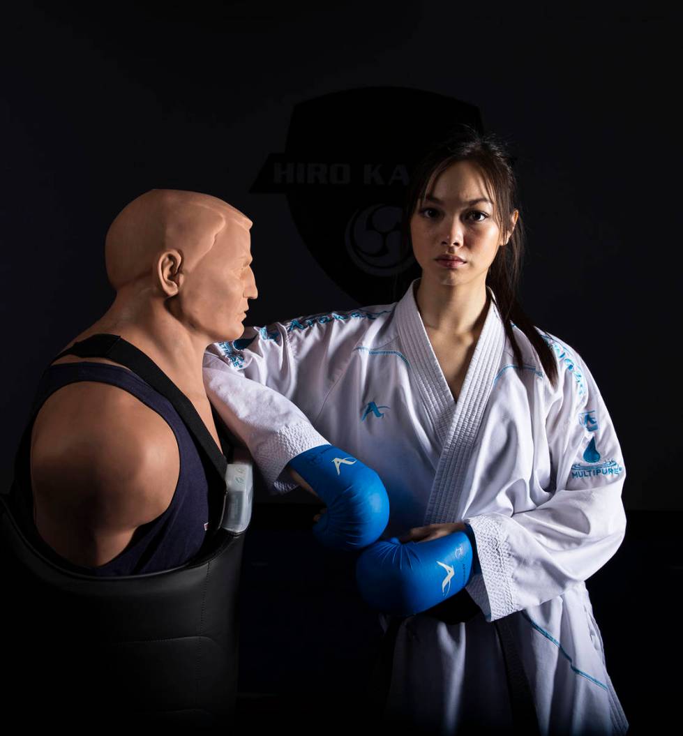 Trinity Allen, 20, at her father's karate studio, is preparing to join the US Olympic team at t ...