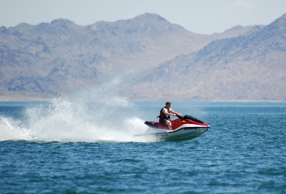 A jet skier zips across Lake Mead. (Las Vegas Review-Journal)