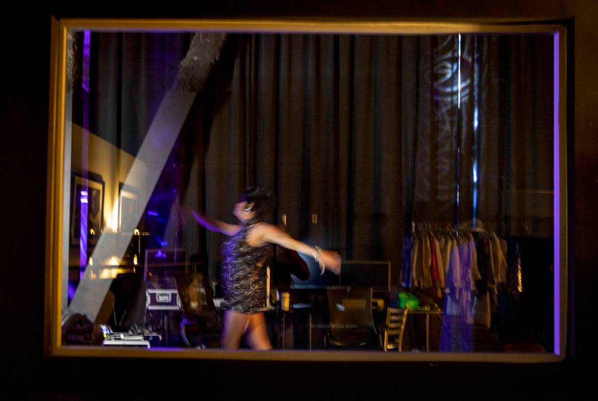Edie warms up in the wings before another "Faaabulous! The Show" drag performance at ...