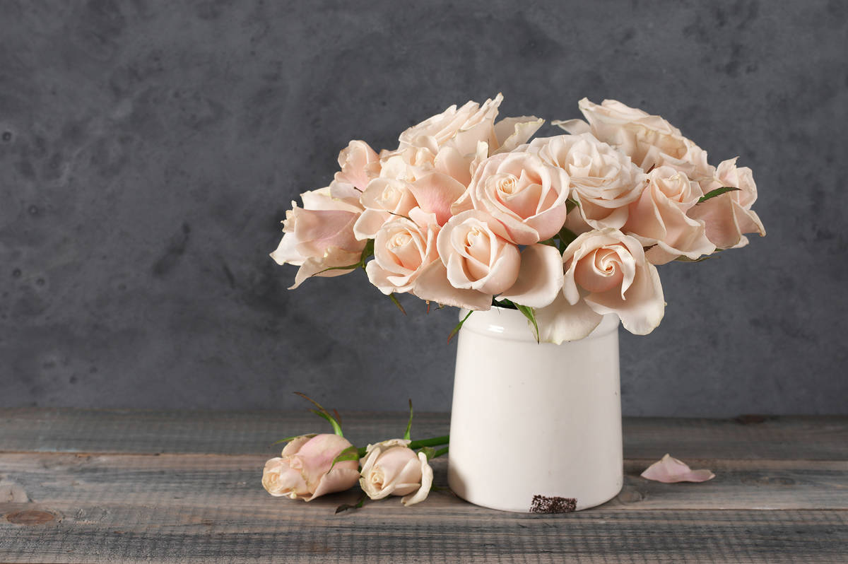 Fresh or faux flowers can add some life to rooms. (Getty Images)