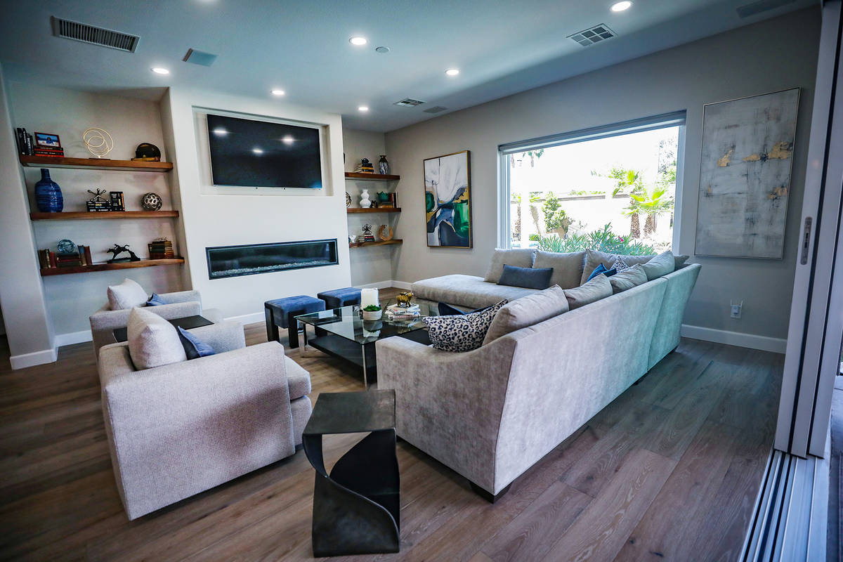 Peggy Sleik and Mike Hug have floating shelves in their Henderson home. (Rachel Aston)