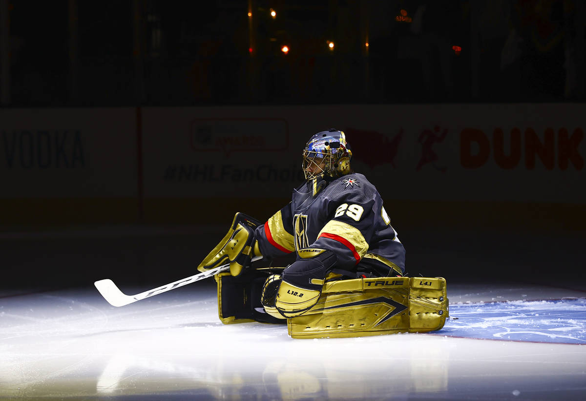 Golden Knights goaltender Marc-Andre Fleury warms up before the start of Game 5 of a first-roun ...