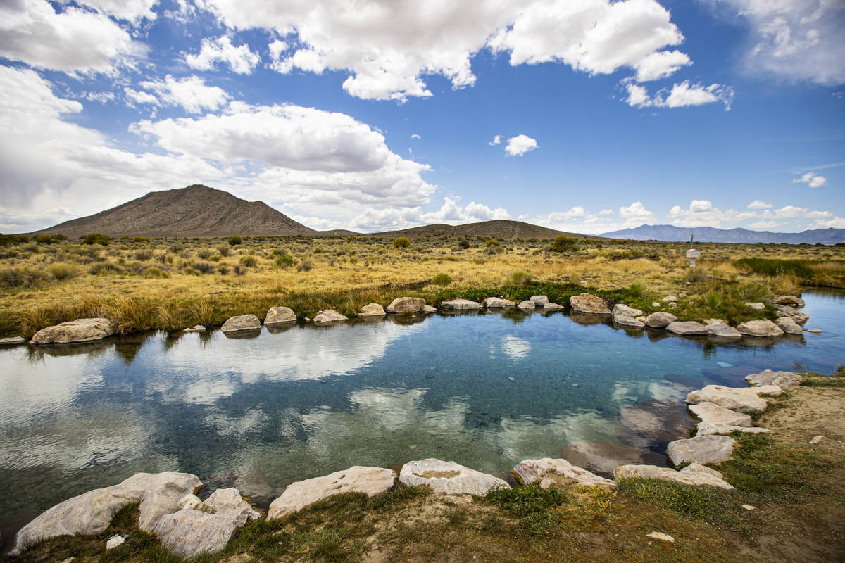 The sky reflects in the water of the Hot Creek Springs and Marsh at the Wayne E. Kirch Wildlif ...
