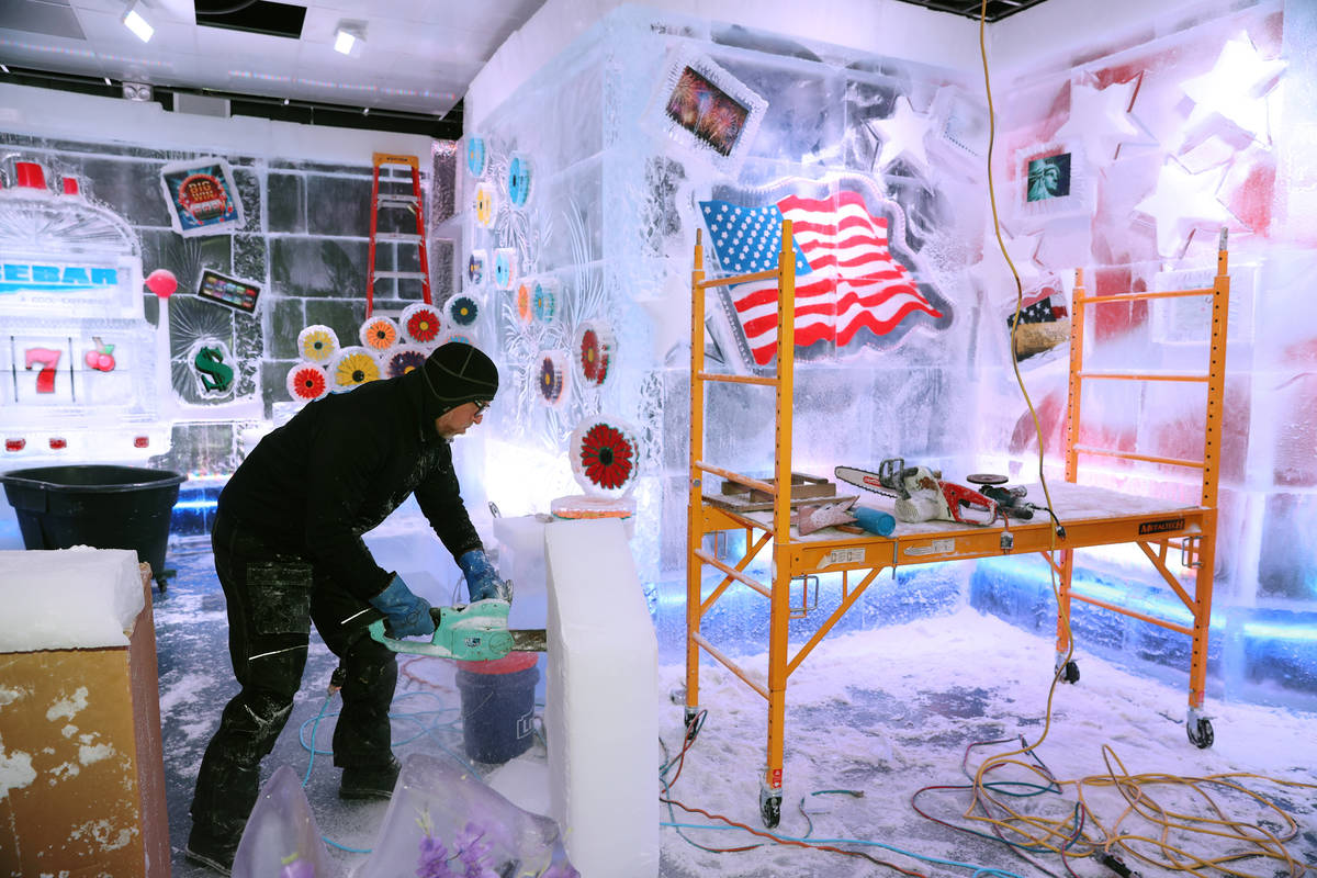Ice artist Peter Slavin carves an ice piece at the Icebar at the LINQ Promenade in Las Vegas, T ...