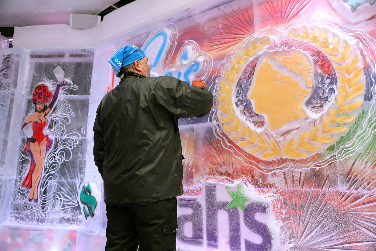 Ice artist Tom Schiller works on a wall at the Icebar at the LINQ Promenade in Las Vegas, Tuesd ...