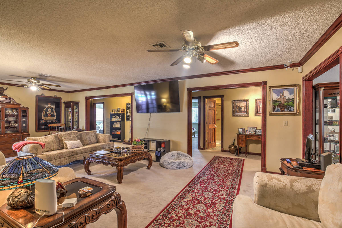 The living room of 9840 W. Ann Road. (Neon Sun Photography)