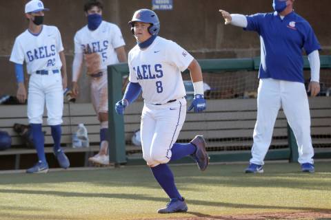 Bishop Gorman's Gunnar Myro (8) runs home for a run against Coronado in the fifth inning of the ...
