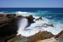 Rocks getting battered by the surf at Montana de Oro State Park on California’s central coast ...