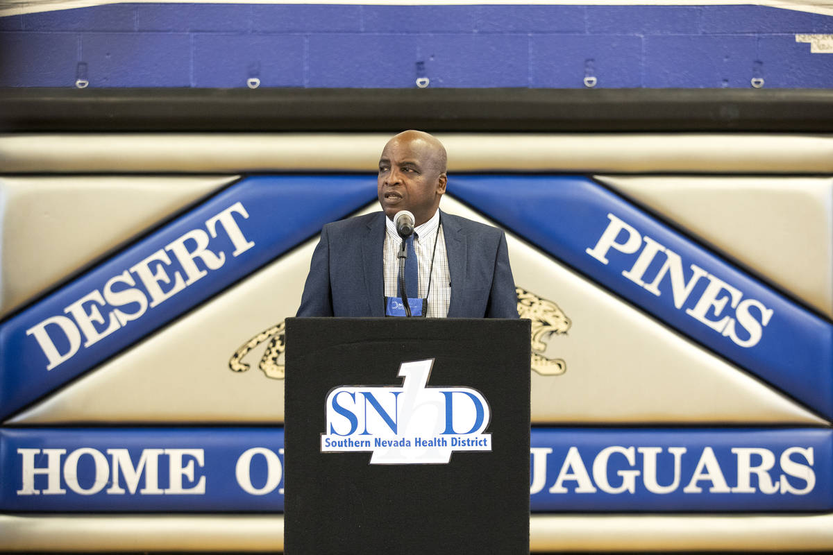 Dr. Fermin Leguen, district health officer of the Southern Nevada Health district, speaks to th ...