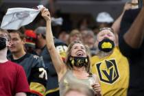 Golden Knights fans cheer for Vegas during Game 7 of the an NHL Stanley Cup first-round playoff ...