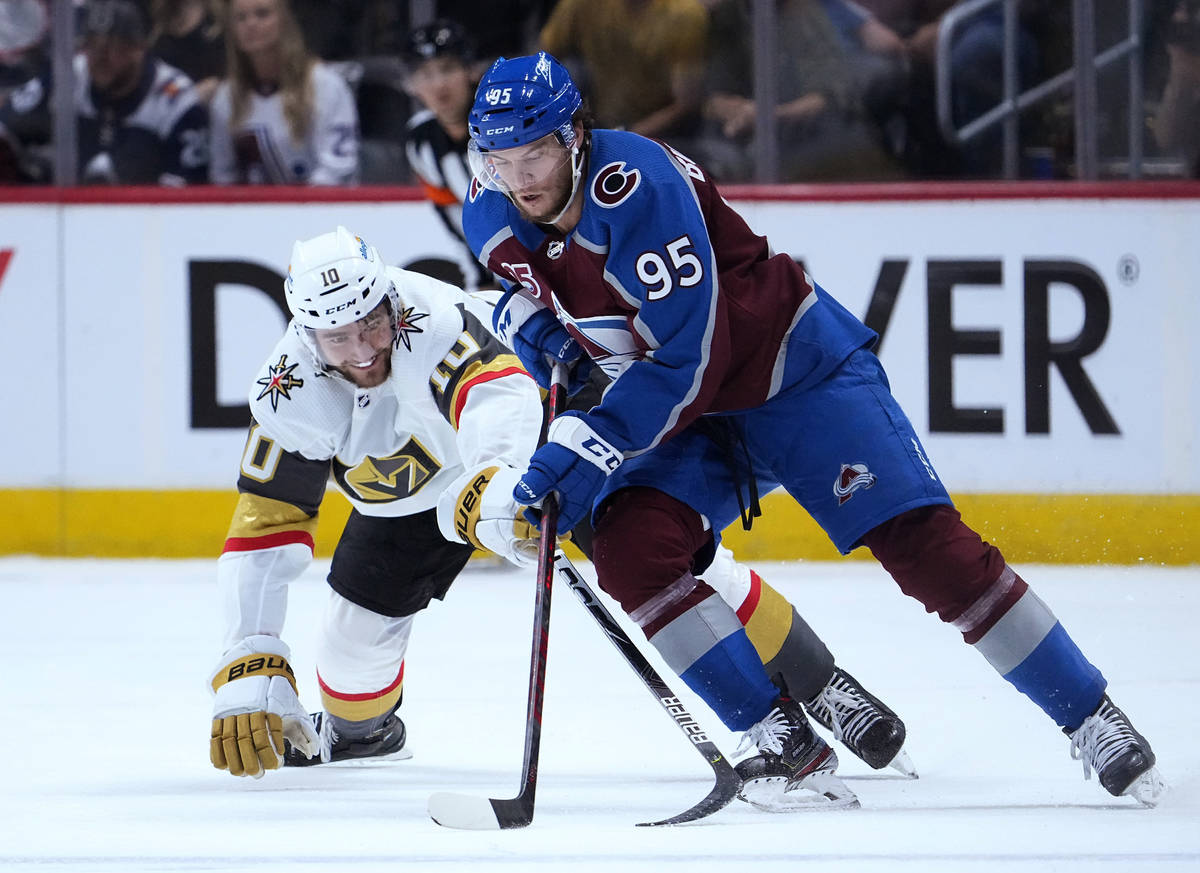 Colorado Avalanche left wing Andre Burakovsky (95) moves the puck against Vegas Golden Knights ...