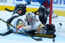 Vegas Golden Knights goaltender Robin Lehner (90) dives for a puck against the Colorado Avalanc ...