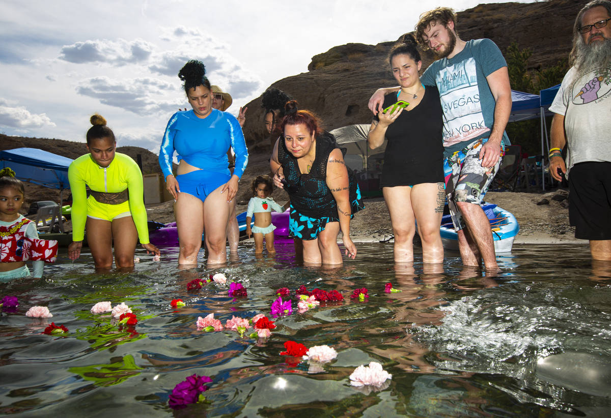 Jeanne Llera, center, mother of Jorge Gomez, who was shot and killed by four Las Vegas police o ...
