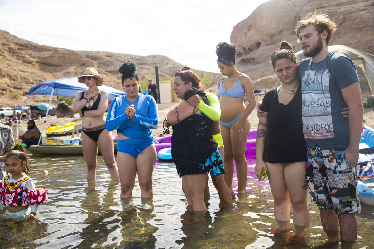 Jeanne Llera, center, mother of Jorge Gomez, who was shot and killed by four Las Vegas police o ...
