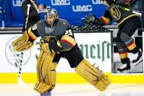 Golden Knights goaltender Marc-Andre Fleury warms up before the start of Game 5 of a first-roun ...