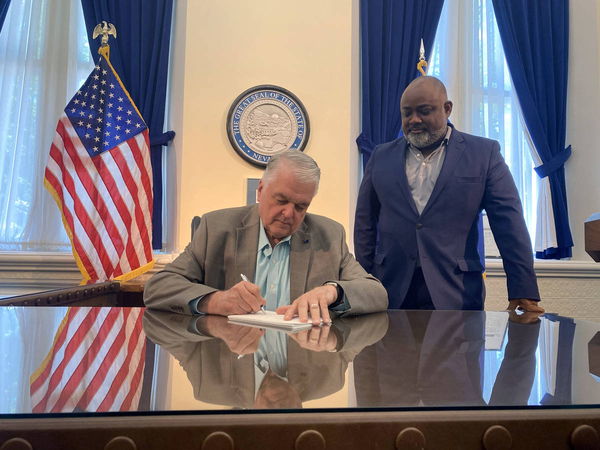 Gov. Steve Sisolak signs Assembly Bill 321, a voting reform bill that makes mail-in voting perm ...