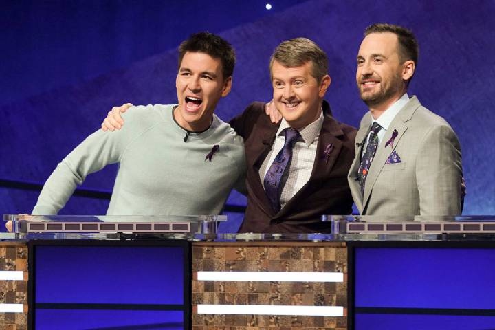 In this image released by ABC, contestants, from left, James Holzhauer, Ken Jennings and Brad R ...