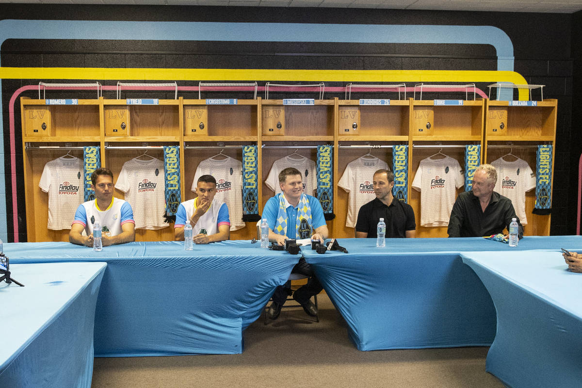 Las Vegas Lights owner Brett Lashbrook, center, speaks during a press conference on the upcomin ...