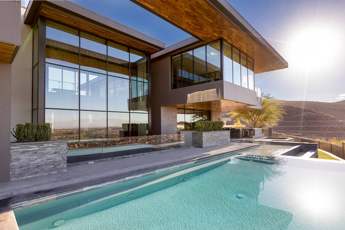 Gene Simmons' two-story, 10,871-square-foot, six-bedroom home with a basement went for $8.2 mil ...
