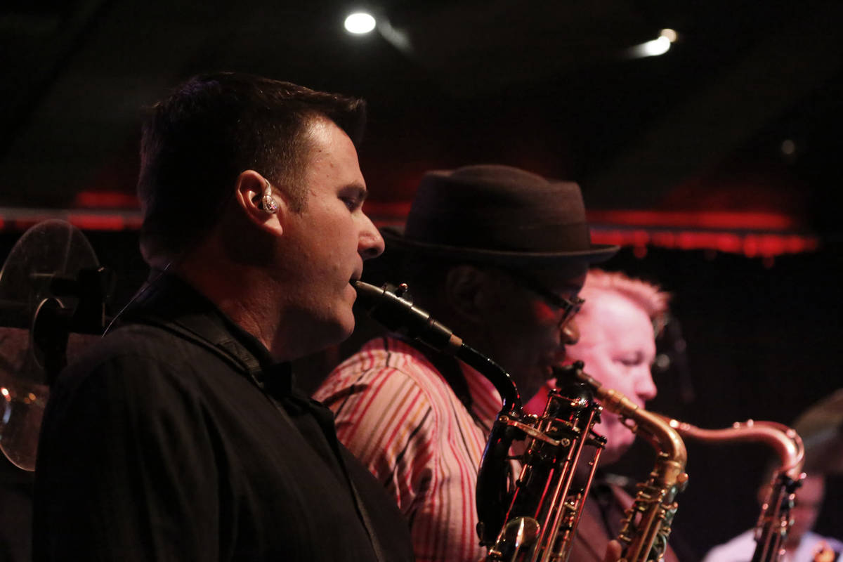 Eric Tewalt, member of the Santa Fe & The Fat City Horns, performs at the Copa Room in Las Vega ...