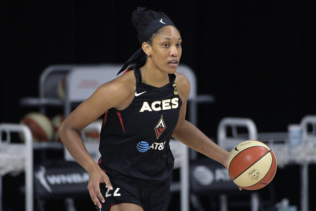 Las Vegas Aces center A'ja Wilson (22) brings the ball up the court during the first half of Ga ...
