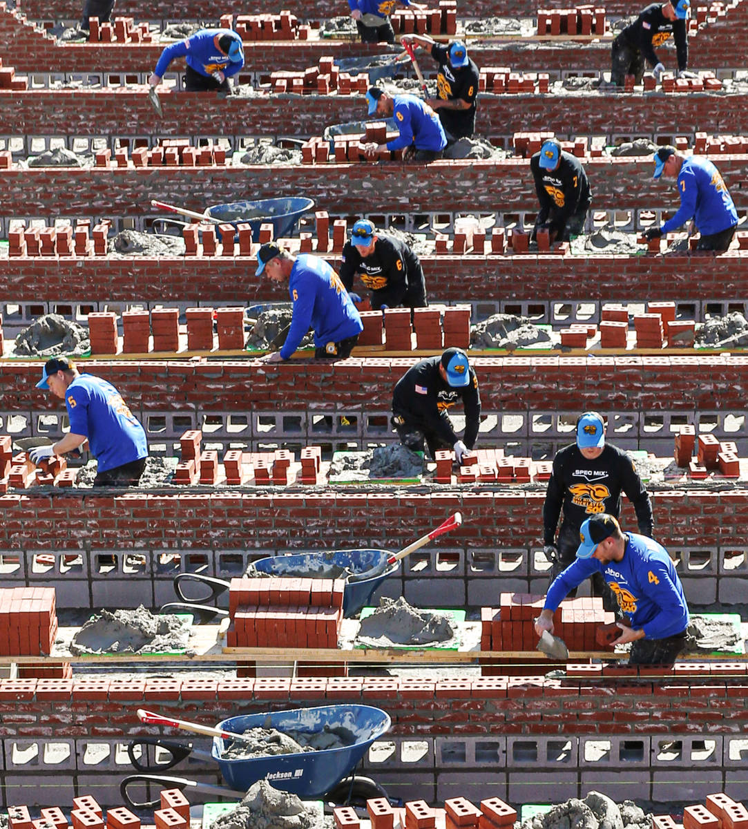 Competitors compete in the 2020 Spec Mix Bricklayer 500 during the World of Concrete on Wednesd ...