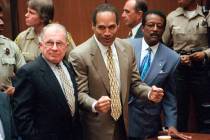 In this Oct. 3, 1995, file photo, O.J. Simpson reacts as he is found not guilty in the death of ...