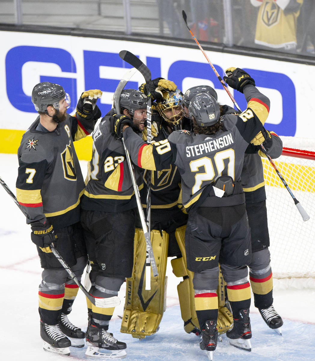 The Golden Knights celebrate a win against the Avalanche in Game 3 of a second-round NHL hockey ...