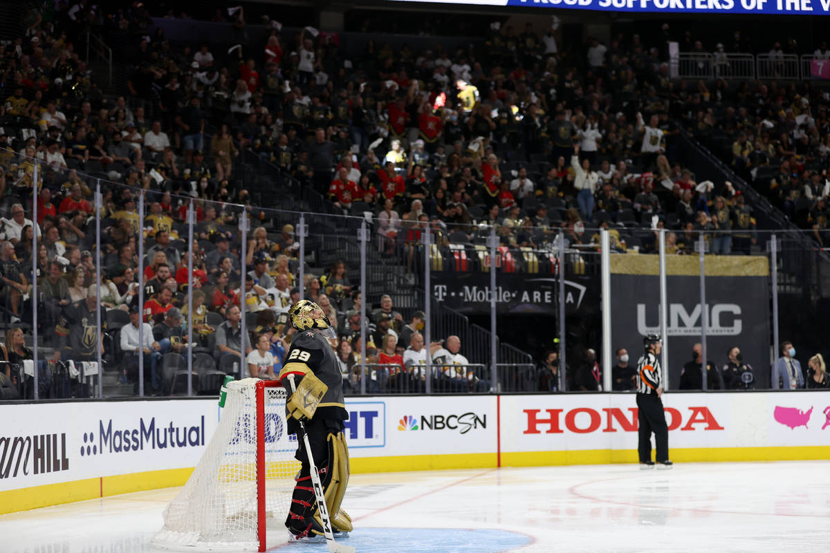 Vegas Golden Knights goaltender Marc-Andre Fleury (29) watches the replay of his save against C ...