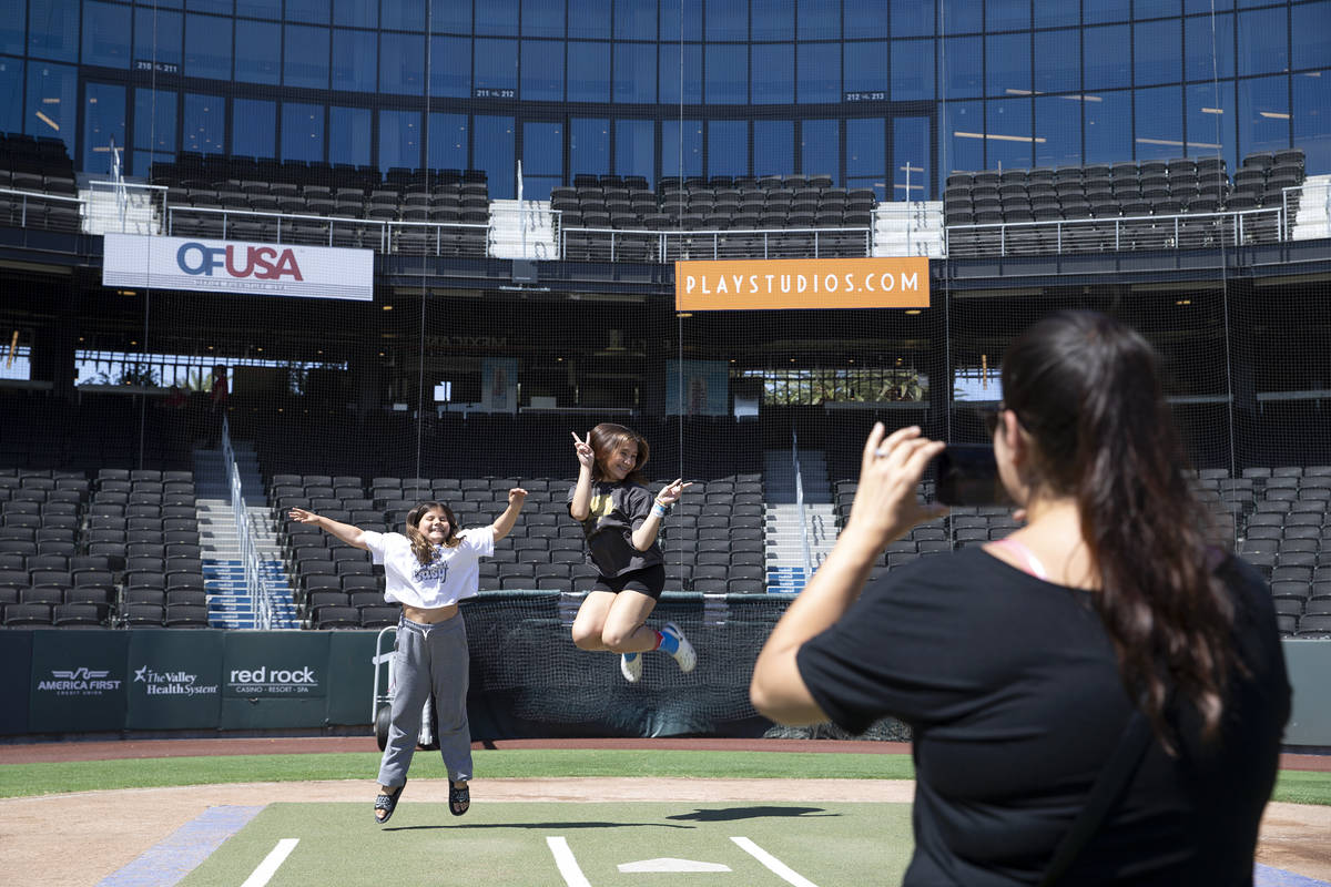 Catalina Ludwig, 8, left, and Emma Ludwig, 13, pose for photos taken by their mom, Lianna Ludwi ...