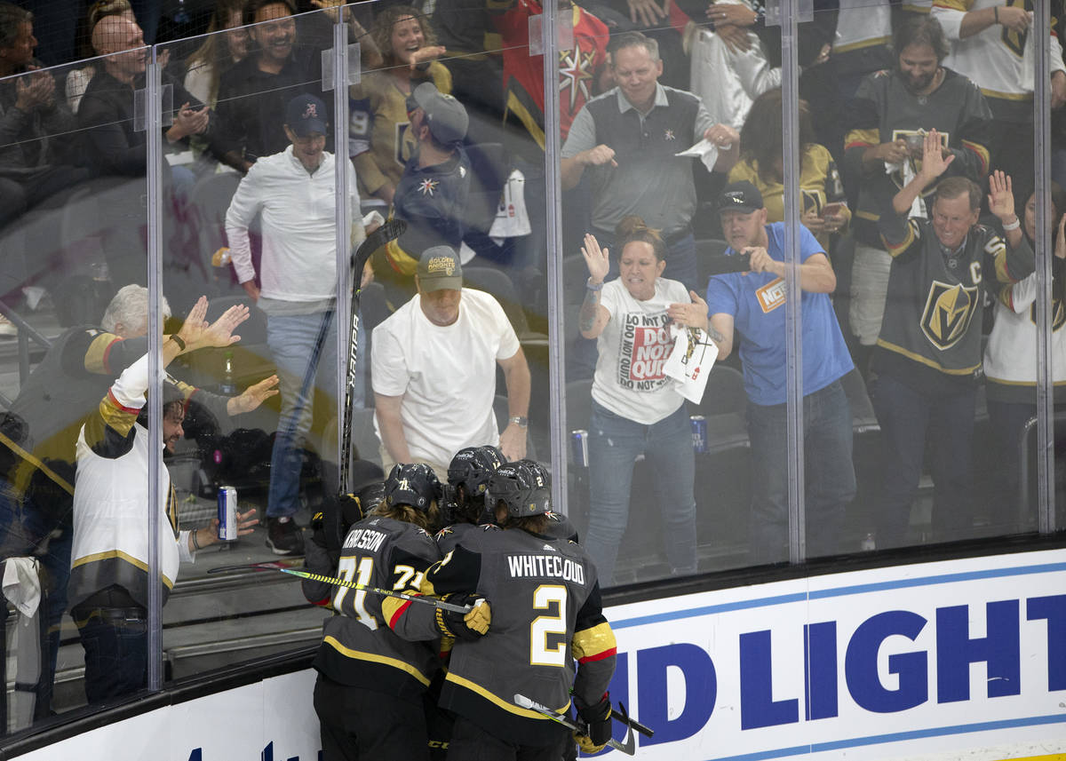 The Golden Knights celebrate a goal scored by center Jonathan Marchessault (81) in the third pe ...