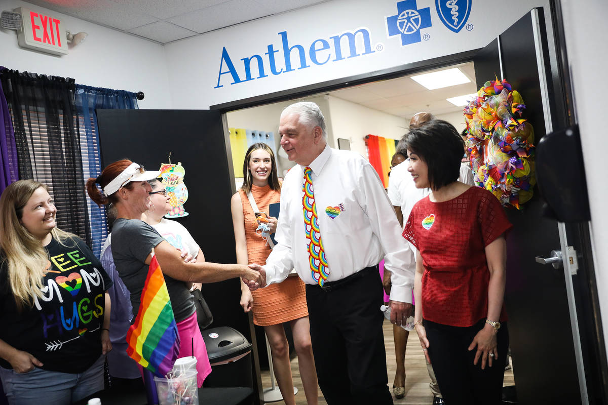 Gov. Steve Sisolak greets vendors alongside his wife Kathy Sisolak as they tour the Henderson E ...