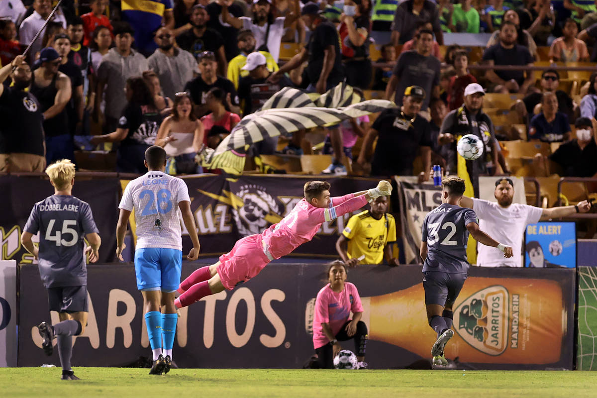 Las Vegas Lights goalkeeper Tomas Romero (30) clears the ball against the Tacoma Defiance in th ...