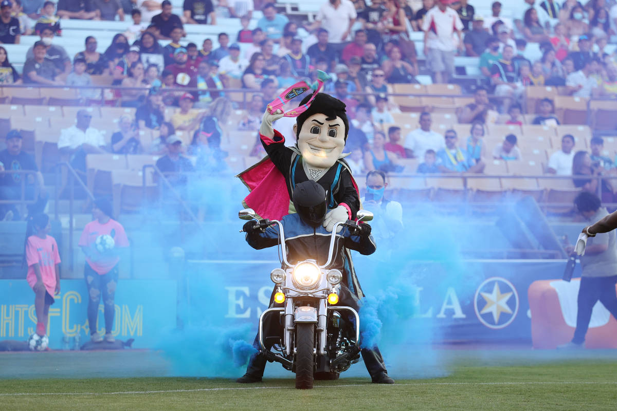 Lights FC Mascot Cash the Soccer Rocker enters Cashman Field for a USL Championship soccer game ...