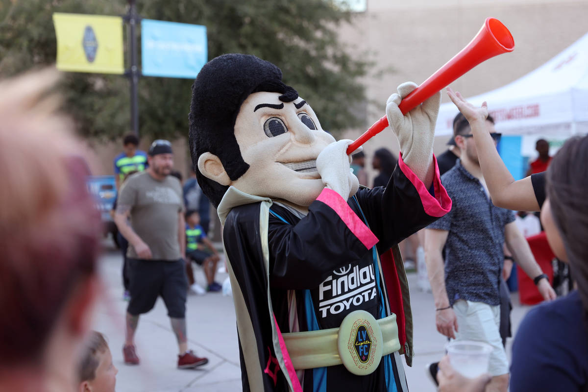Lights FC Mascot Cash the Soccer Rocker entertains the crowd before the start of a USL Champion ...