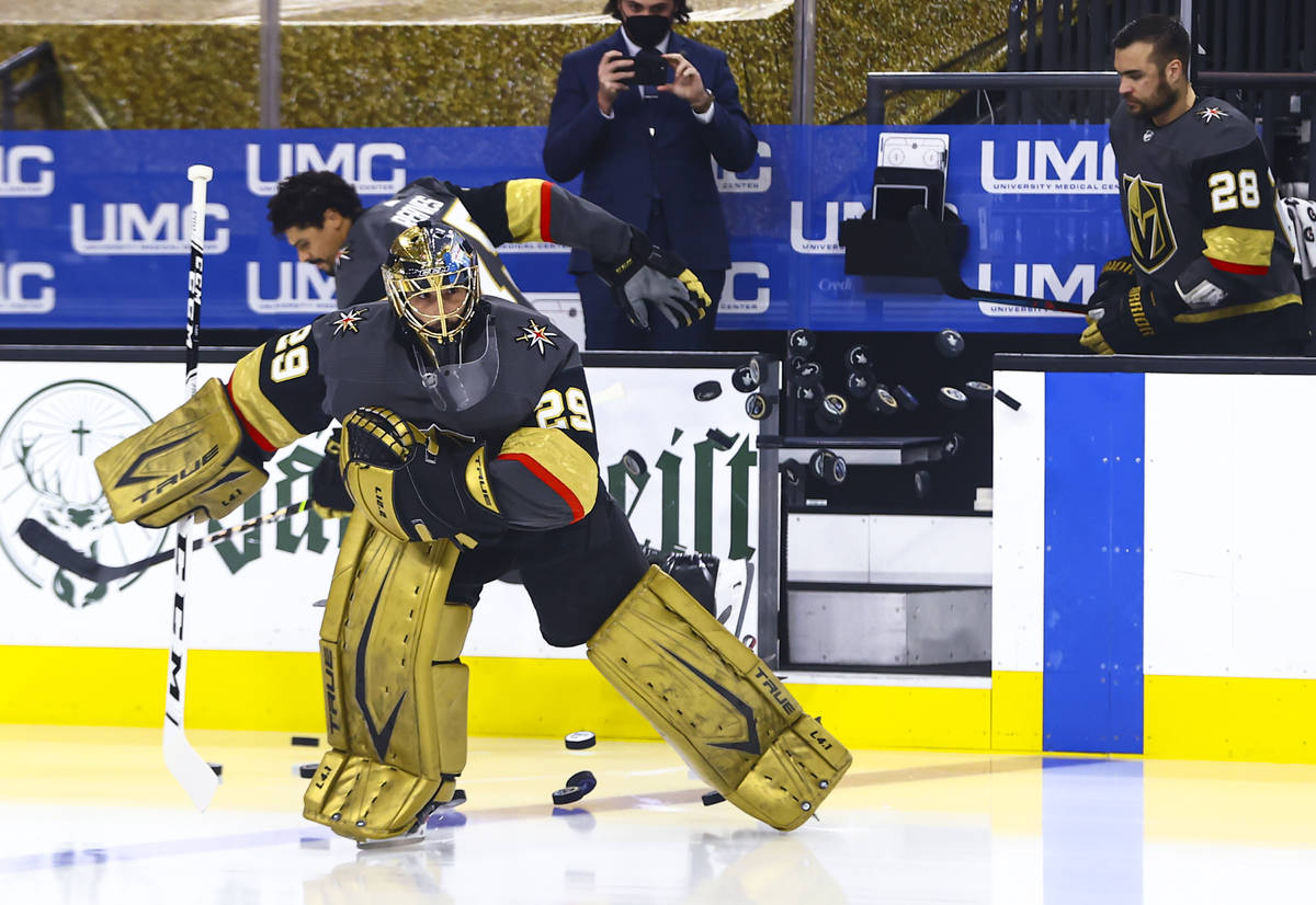 Golden Knights mgoaltender Marc-Andre Fleury warms up before Game 4 of an NHL hockey Stanley Cu ...