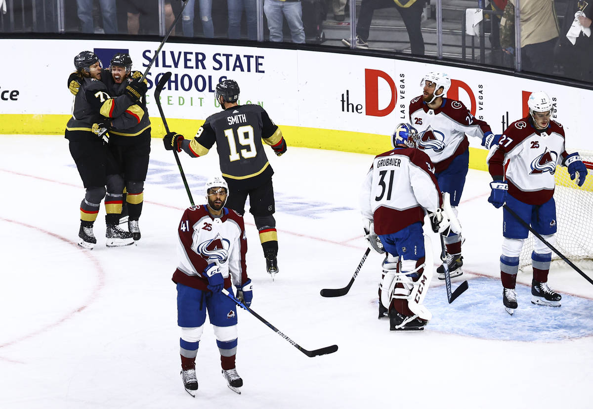 Golden Knights' William Karlsson, left, celebrates a goal by Jonathan Marchessault during the f ...