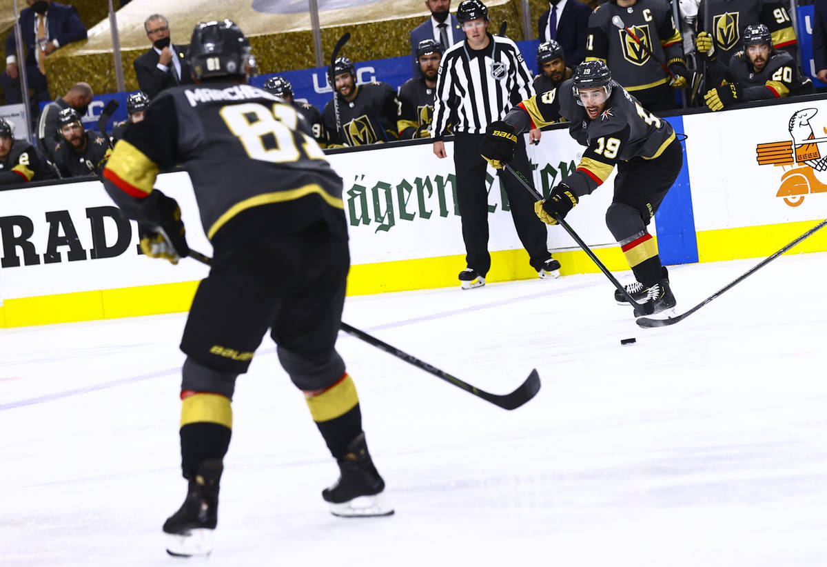 Golden Knights' Reilly Smith (19) passes the puck to Jonathan Marchessault (81) during the seco ...
