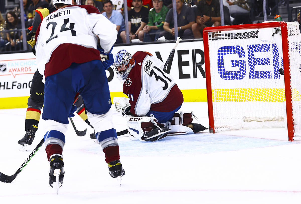 Golden Knights' Jonathan Marchessault, not pictured, gets the puck past Colorado Avalanche goal ...