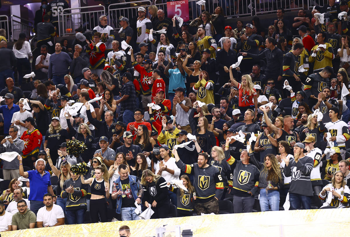 Golden Knights fans cheer at the end of the second period of Game 4 of an NHL hockey Stanley Cu ...