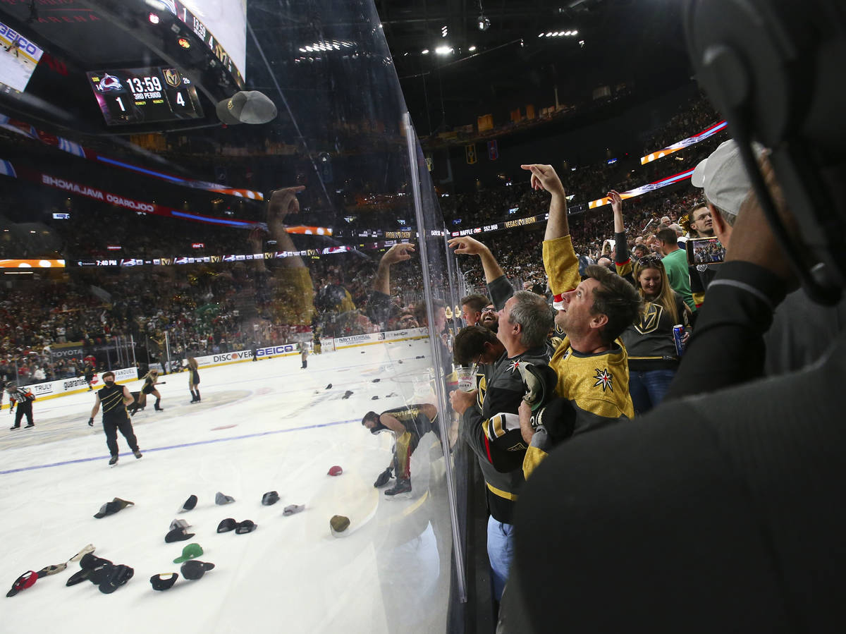 Golden Knights fans celebrate a hat trick by Jonathan Marchessault, not pictured, during the th ...