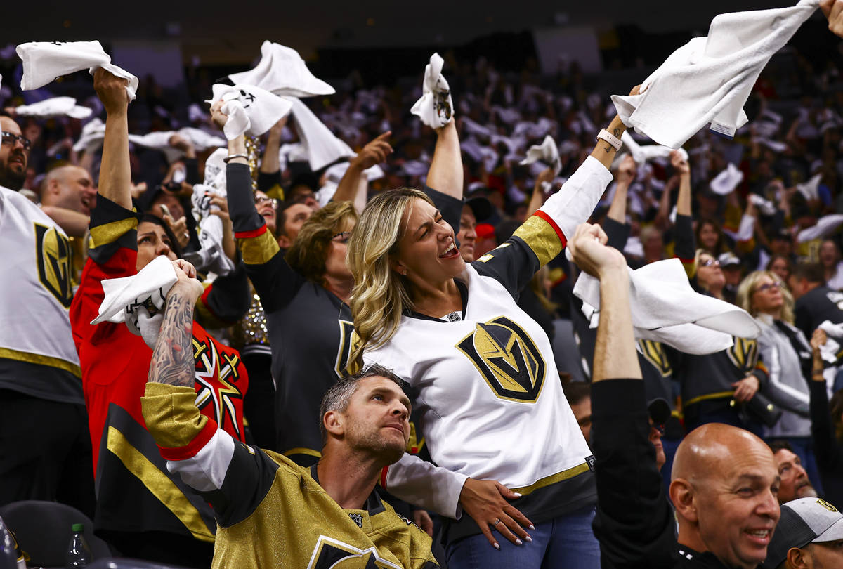 Golden Knights fans cheer during the third period of Game 4 of an NHL hockey Stanley Cup second ...