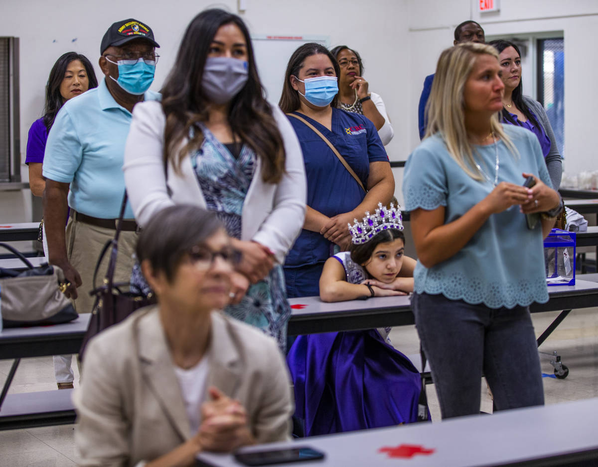 Attendees including Miss Nevada Role Model Tayla Westerman listen in during a ceremony for four ...