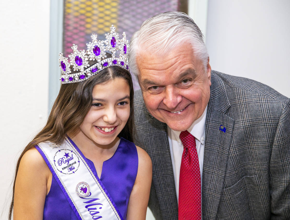 Gov. Steve Sisolak with Miss Nevada Role Model Tayla Westerman following a ceremony of four bil ...
