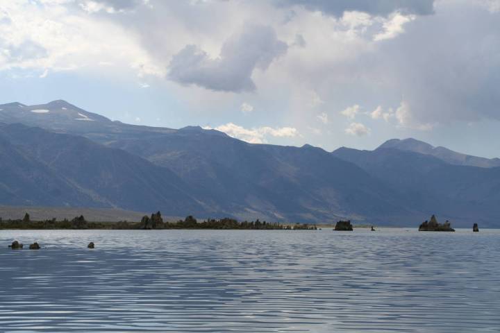 Mono Lake, located at the base of the east side of the Sierra Nevada Range is about two- and on ...