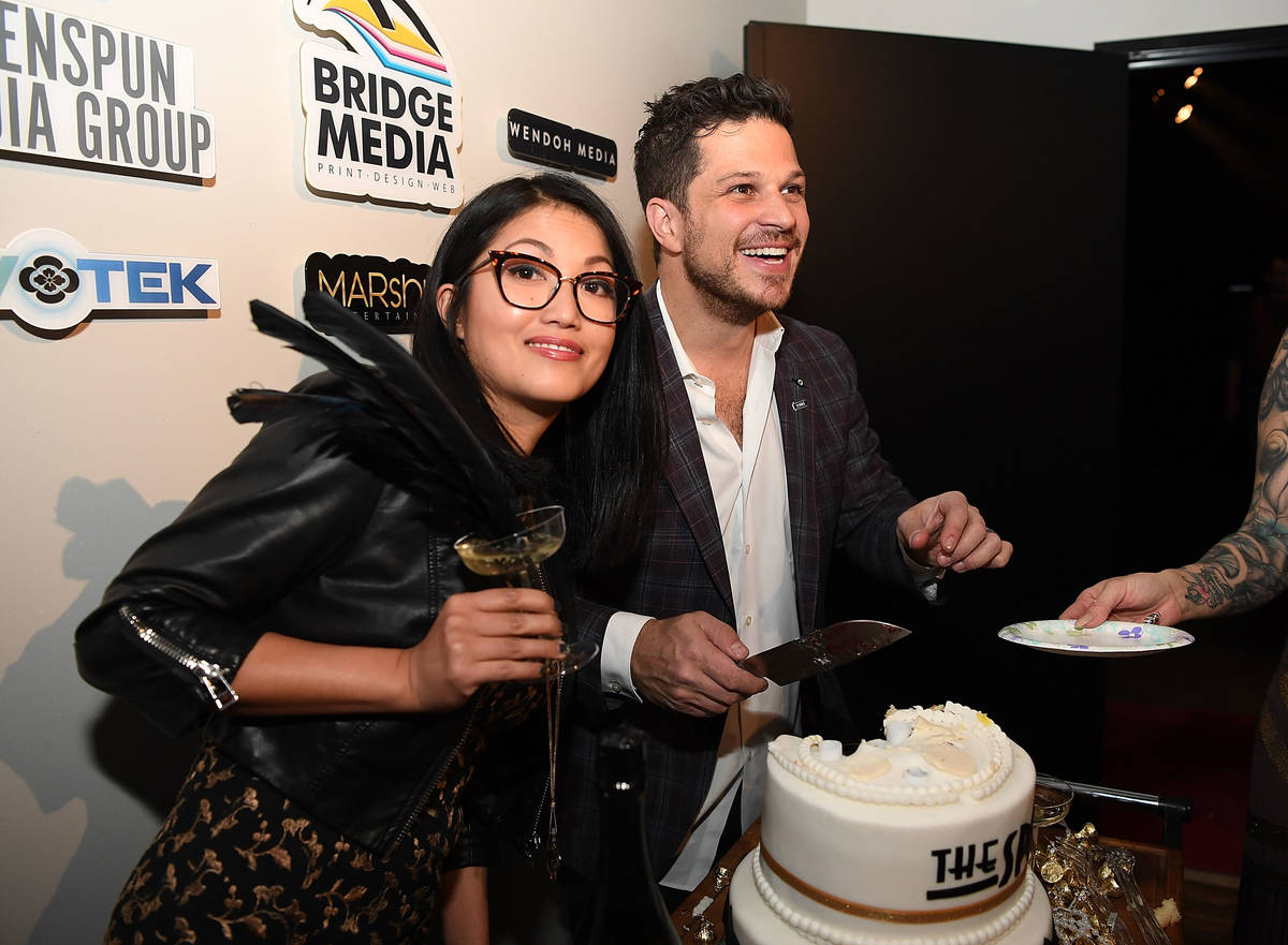 Cheryl Daro and Mark Shunock celebrate the grand opening of The Space, the new home of "Mondays ...