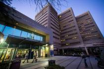 People walk outside of the Clark County Detention Center in downtown Las Vegas on Tuesday, Oct. ...