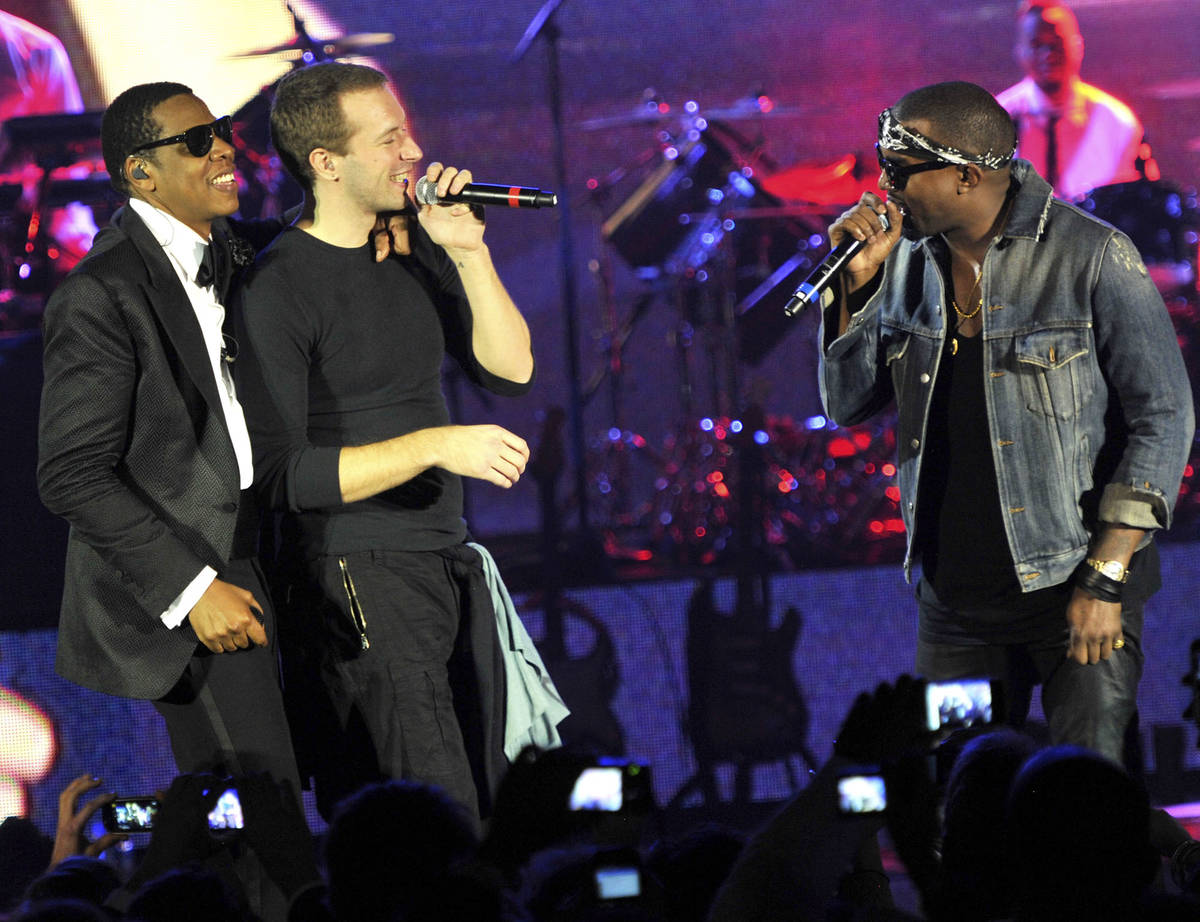 Rapper Jay-Z, musician Chris Martin of Coldplay, and rapper Kanye West perform onstage at The C ...