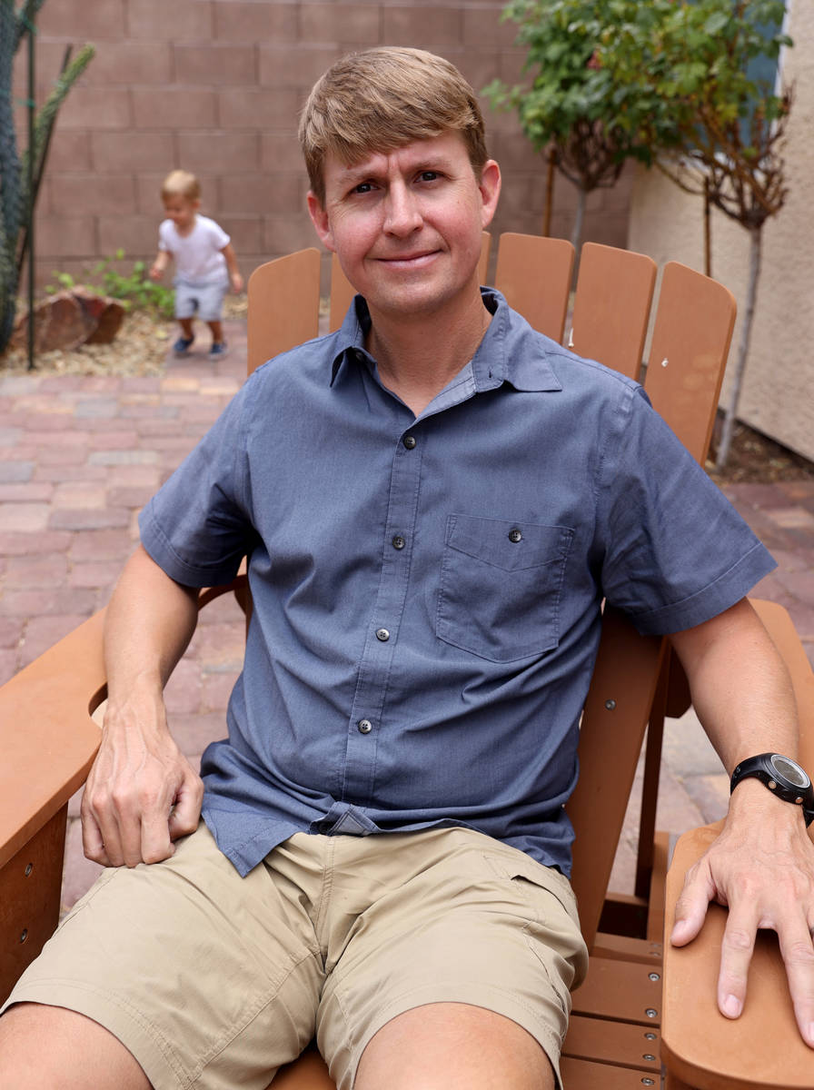 Shane Peterson with his son, Henry, 21 months, at his Henderson home on June 9, 2021. Peterson ...